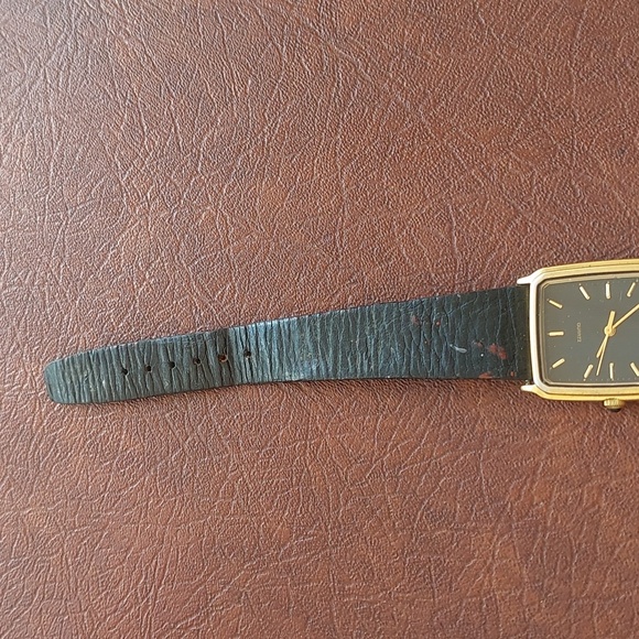 Vintage Timex Tank-Style Quartz Watch with Gold-Tone Case & Black Strap - Picture 8 of 14